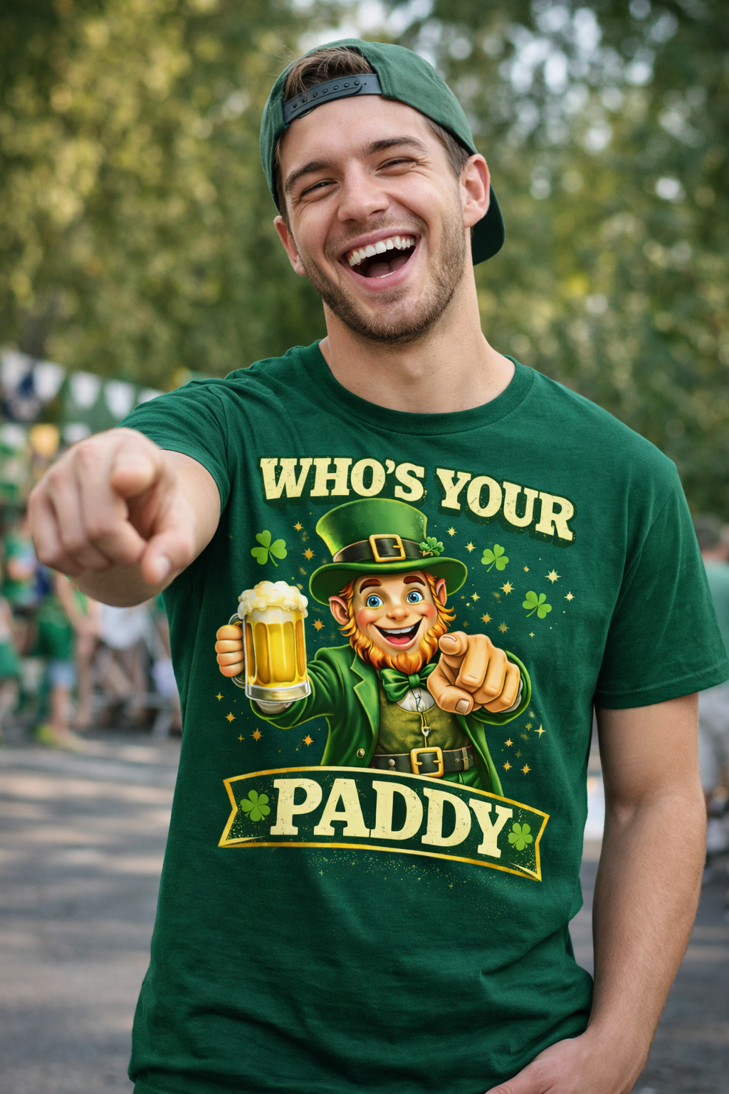 Man wearing a green t-shirt with 'WHO'S YOUR PADDY' design, pointing forward.